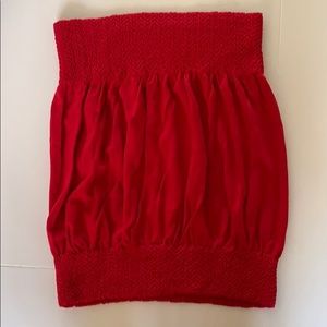 Red tube top with elastic top and bottom.